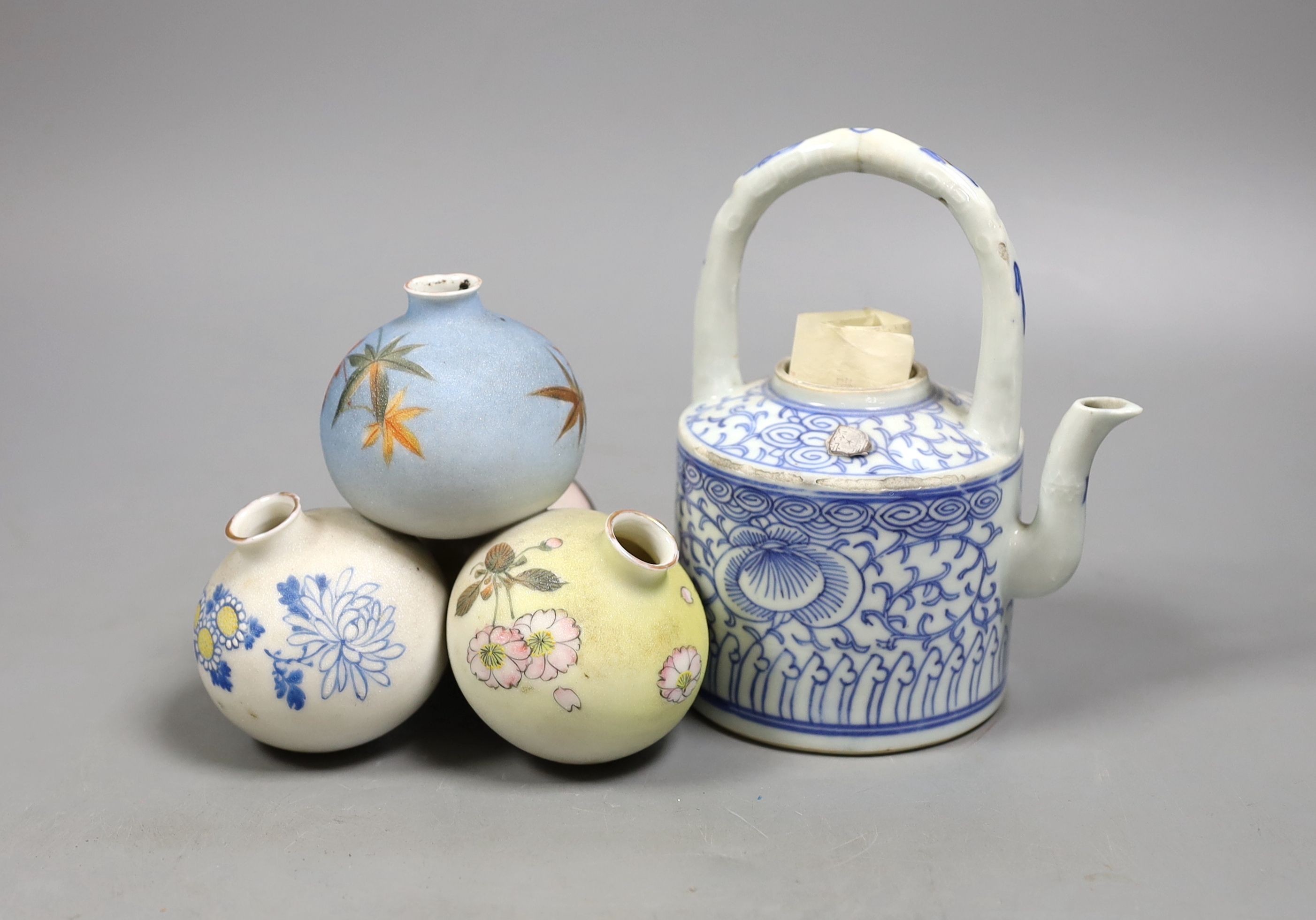 A Chinese blue and white teapot - no cover and a Japanese multiple globular posy vase, Teapot 15 cms high including handle.